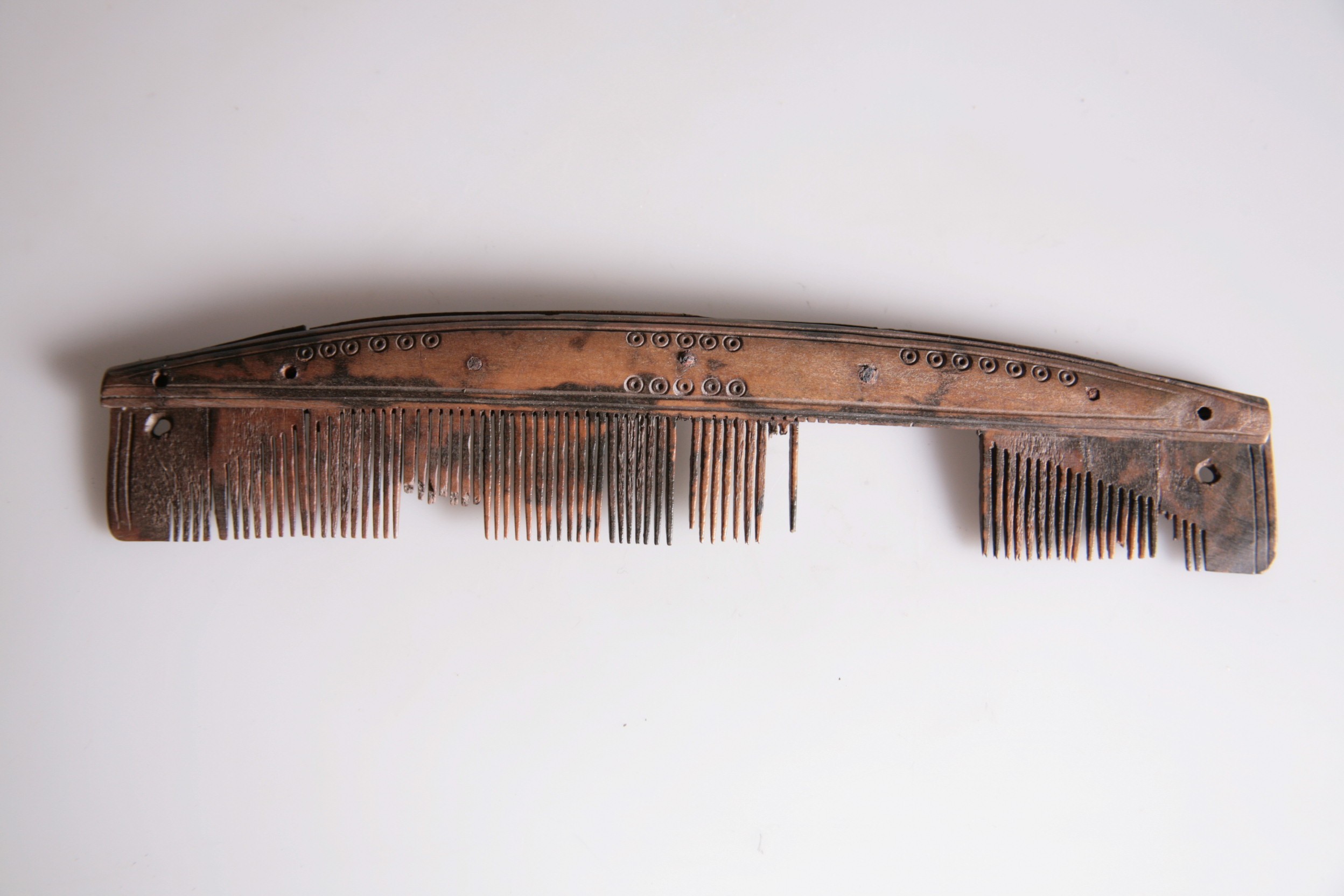 Foto van drielagen:eenzijdig getand