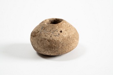 Foto van Grijsbakkend gedraaid aardewerk